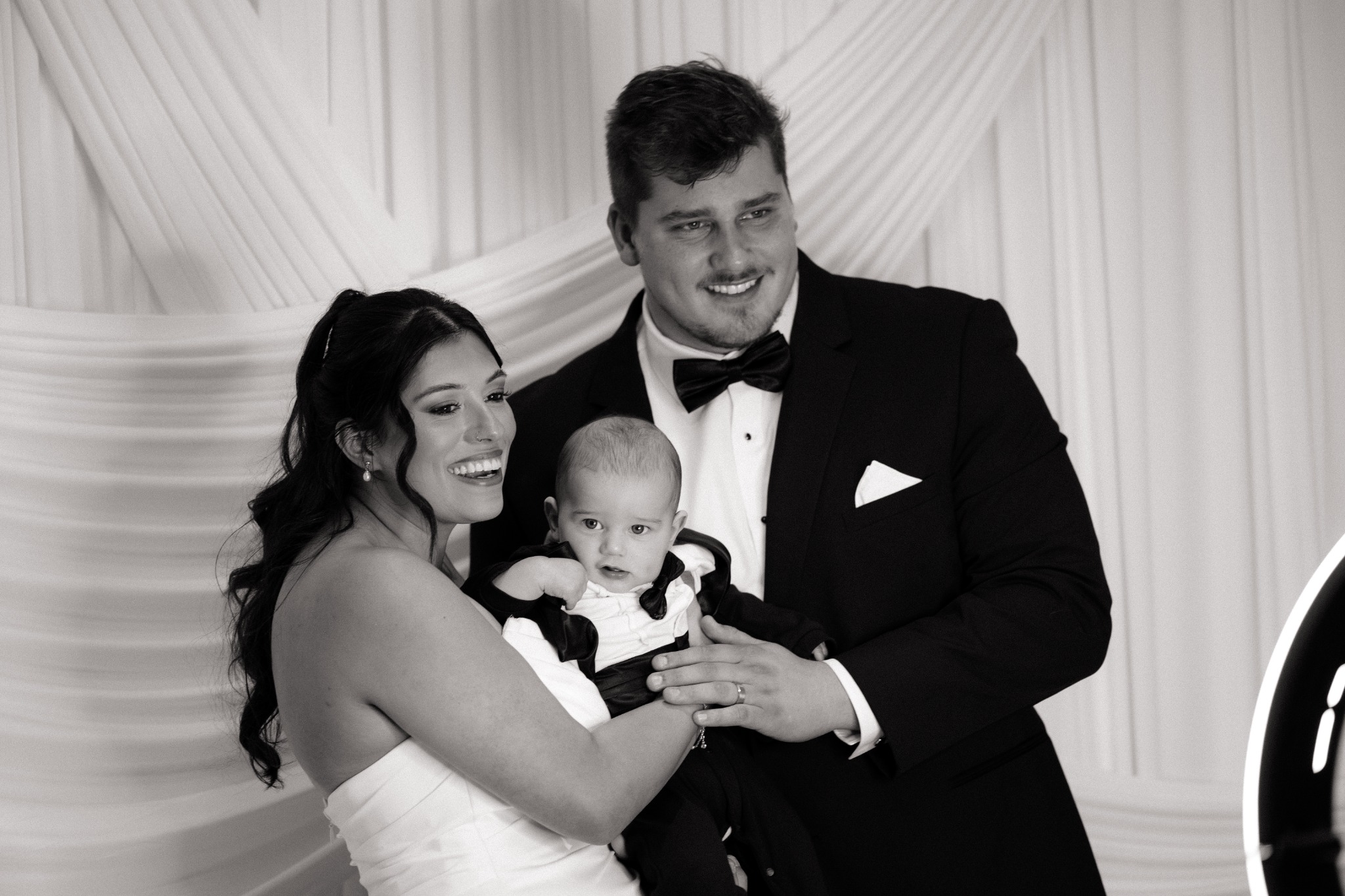 Family enjoying the Skylight Photo Booth at a wedding