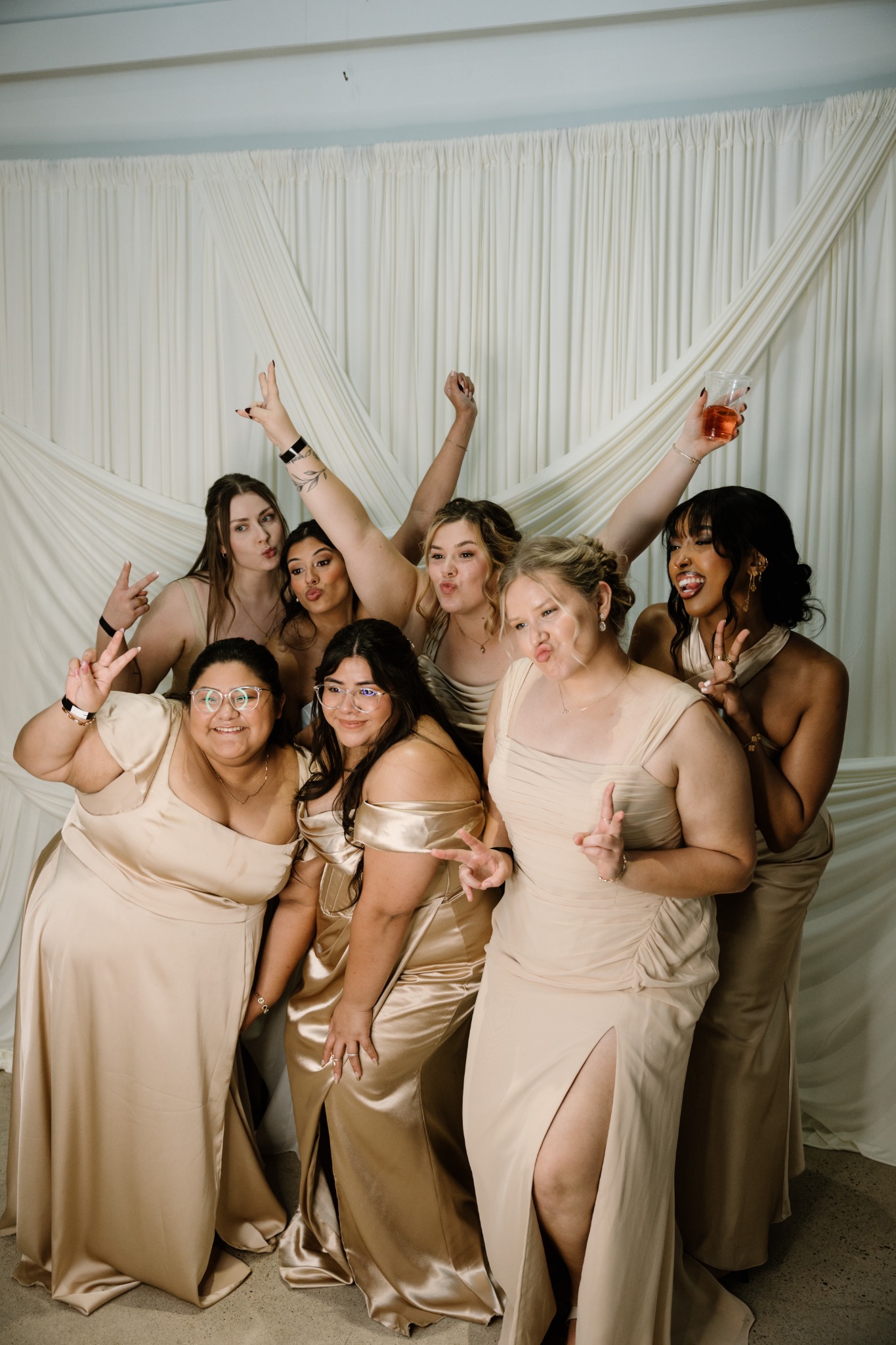 Wedding party using the photo booth